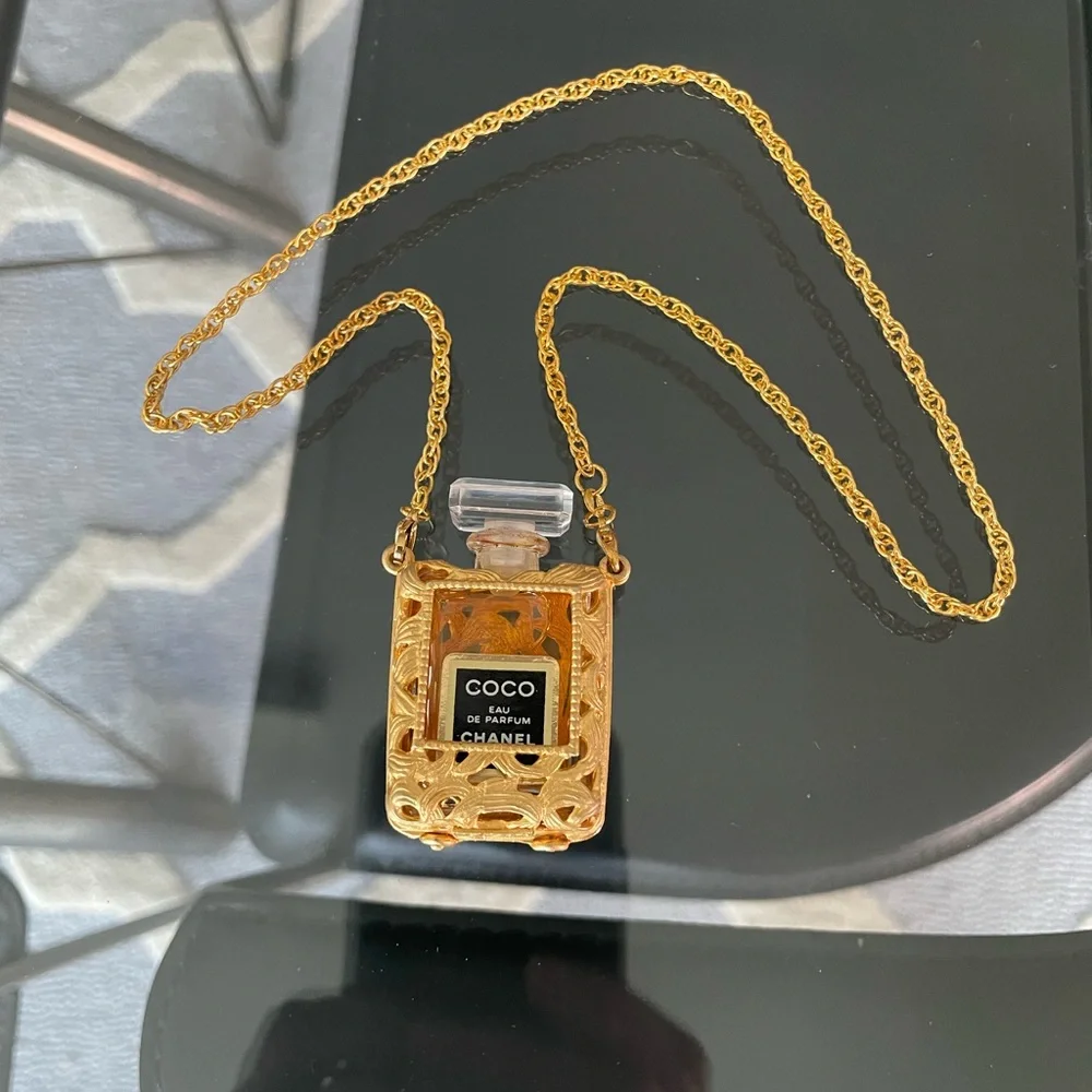 CHANEL Gold Tone Coco Eau de Parfum Bottle Pendant Necklace with coco bottle 18” - Picture 6 of 7